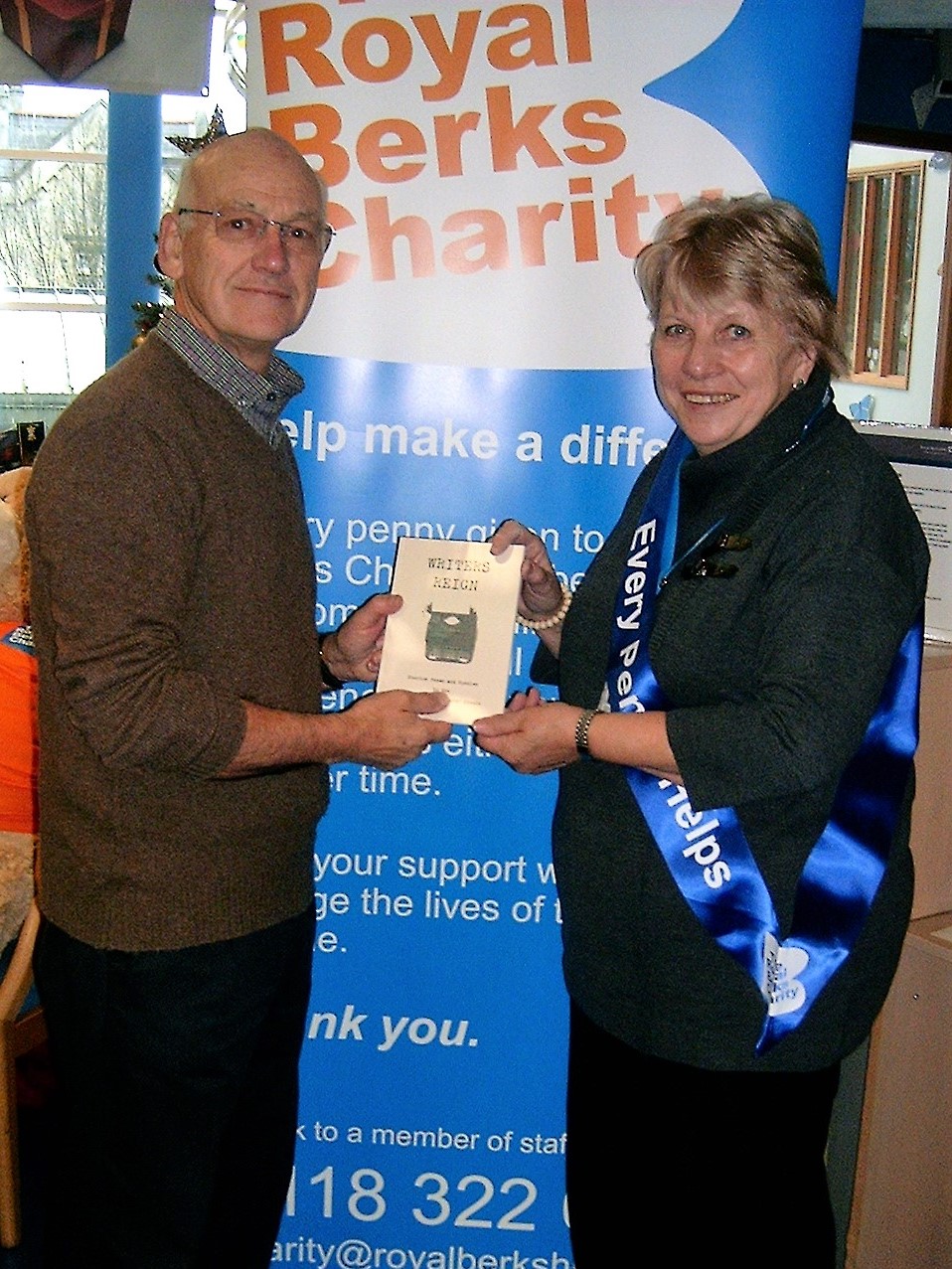 Tilehurst Writing Circle donates cash to charity