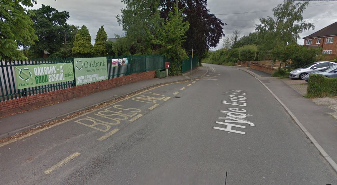 Boy taken to hospital after bike collides with parked car in Shinfield