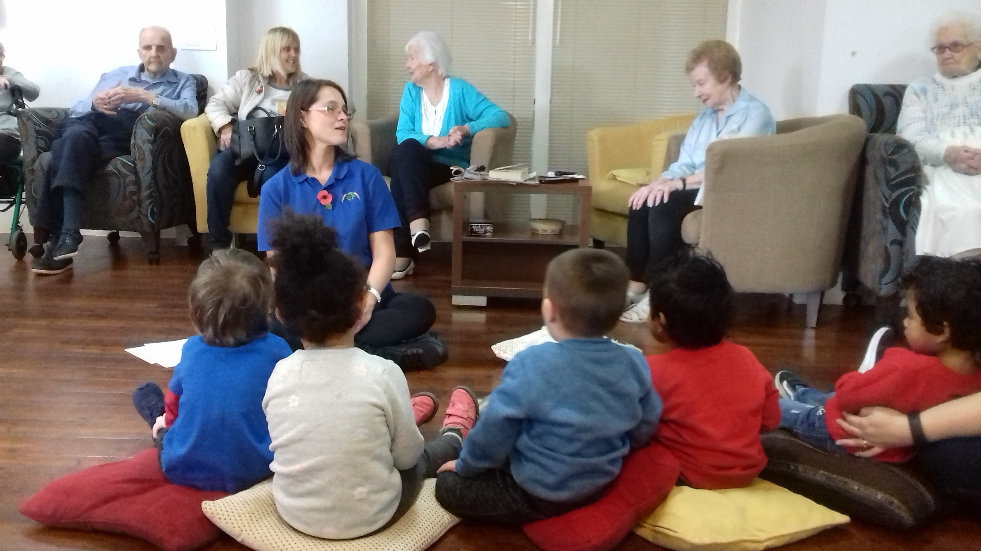 Schoolchildren and toddlers visit Tilehurst care homes