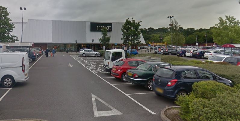 Teenager taken to hospital after collision at Next in Calcot