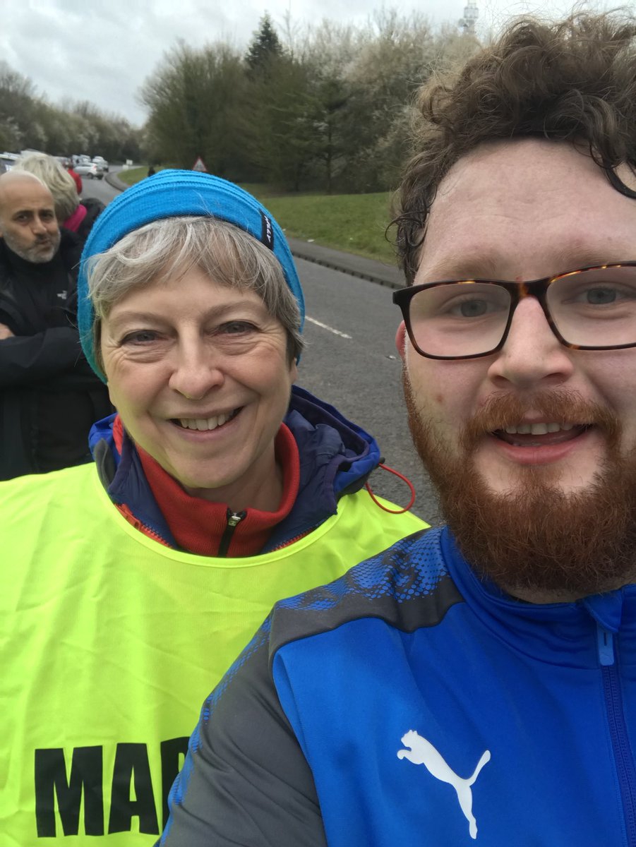 Runners stop for selfies with Prime Minister Theresa May at Maidenhead Easter race