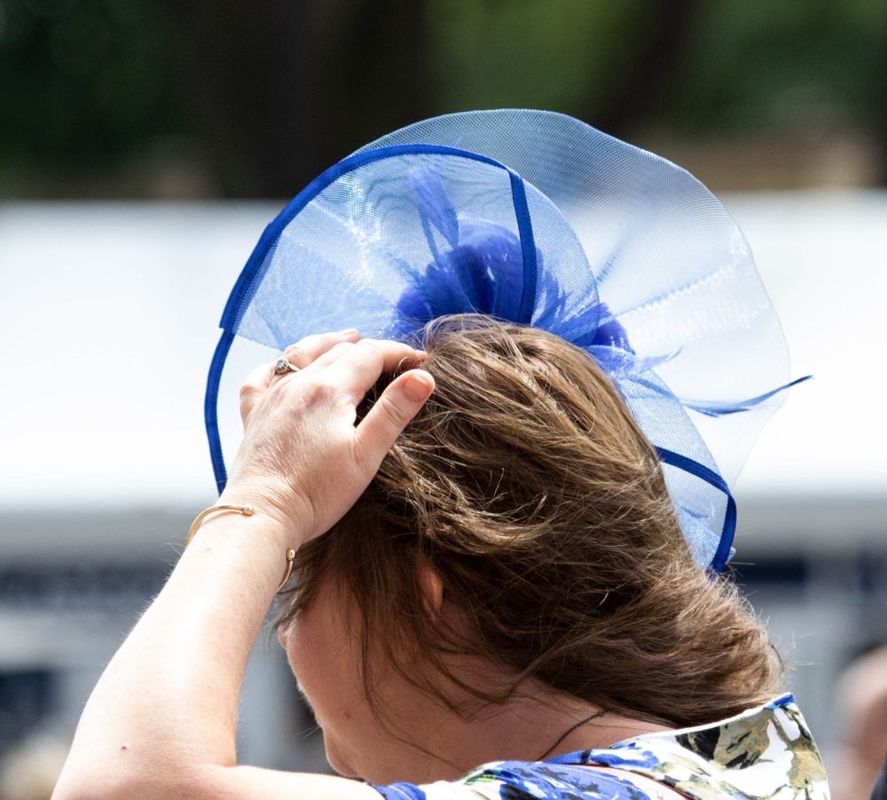 hat-holding-200618--19-