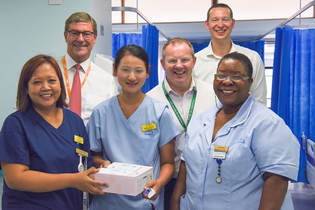 NHS-70-cake-Dorrell-ward-with-Steve-Mc-Manus-CEO-and-Graham-Sims---Trust-Chairman--small-version