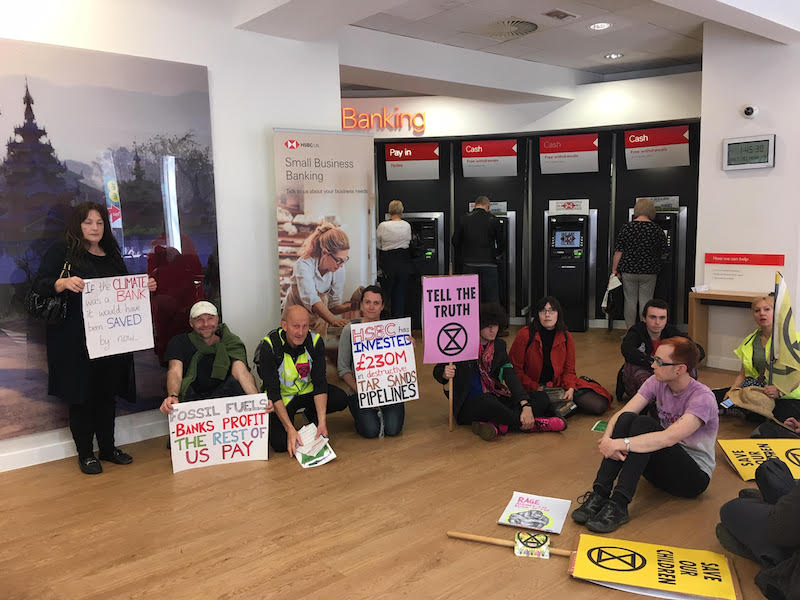 Environmental-activists-protest-against-banks-in-Reading-town-centre-1