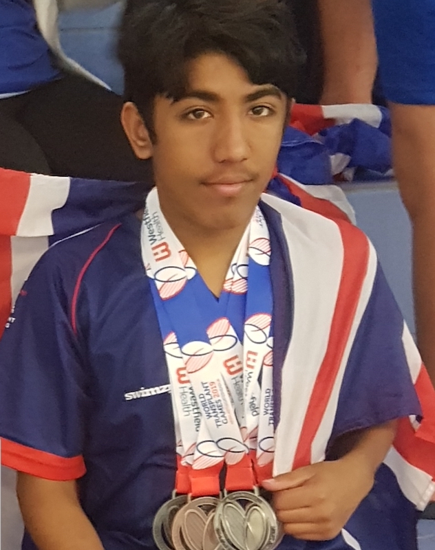 Keen-swimmer-returns-to-Birmingham-school-with-medals-and-a-massive-smile-1