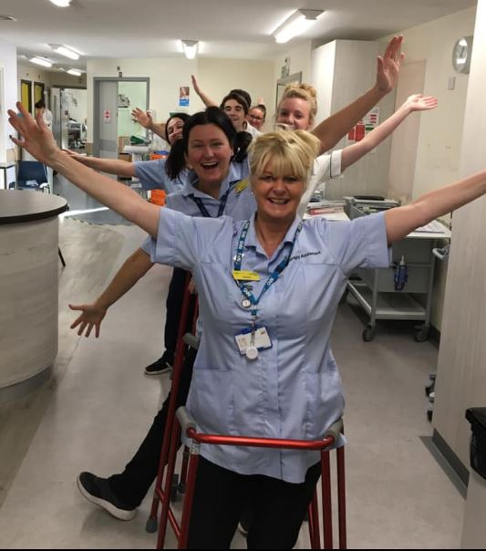 Red framed walkers helping to reduce falls