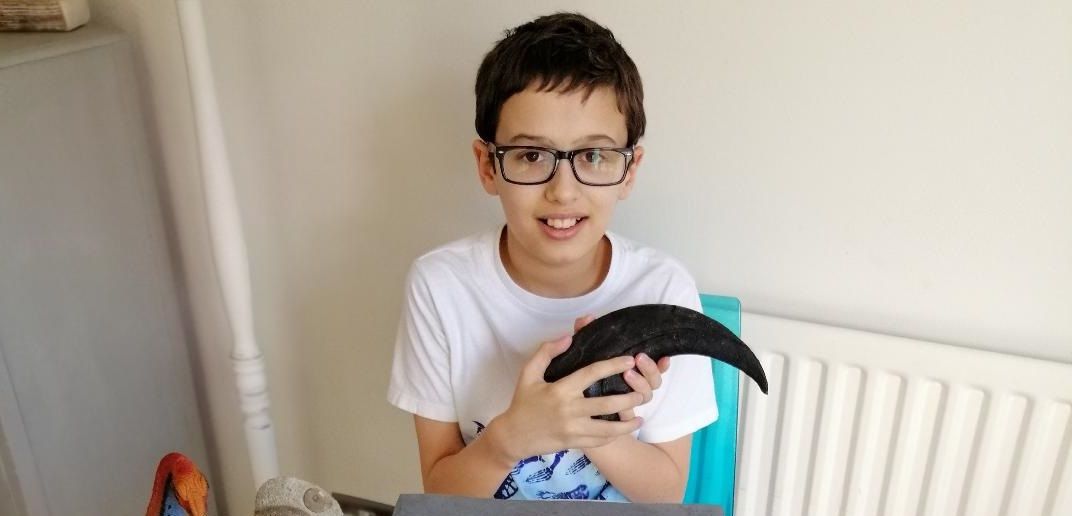 Young Charlie chats fossils with friends online