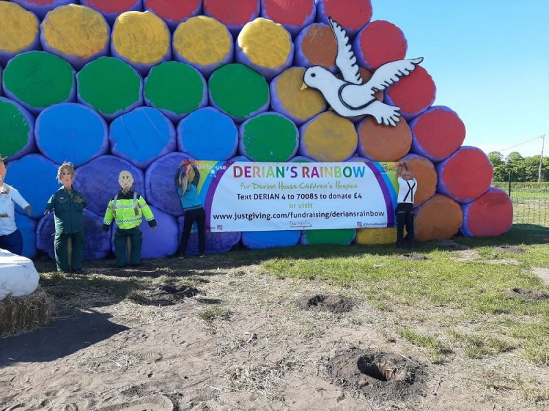 Giant rainbow made out of hay bales in Wigan for children's hospice