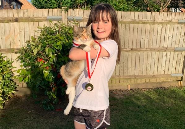 Young gymnasts take part in virtual tumbling competition