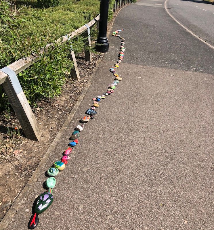 Mystery pebble snake in Witham Saint Hughs continues to grow