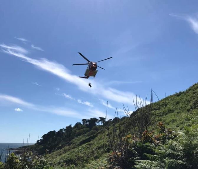 Coast path walker airlifted to hospital following ankle injuries