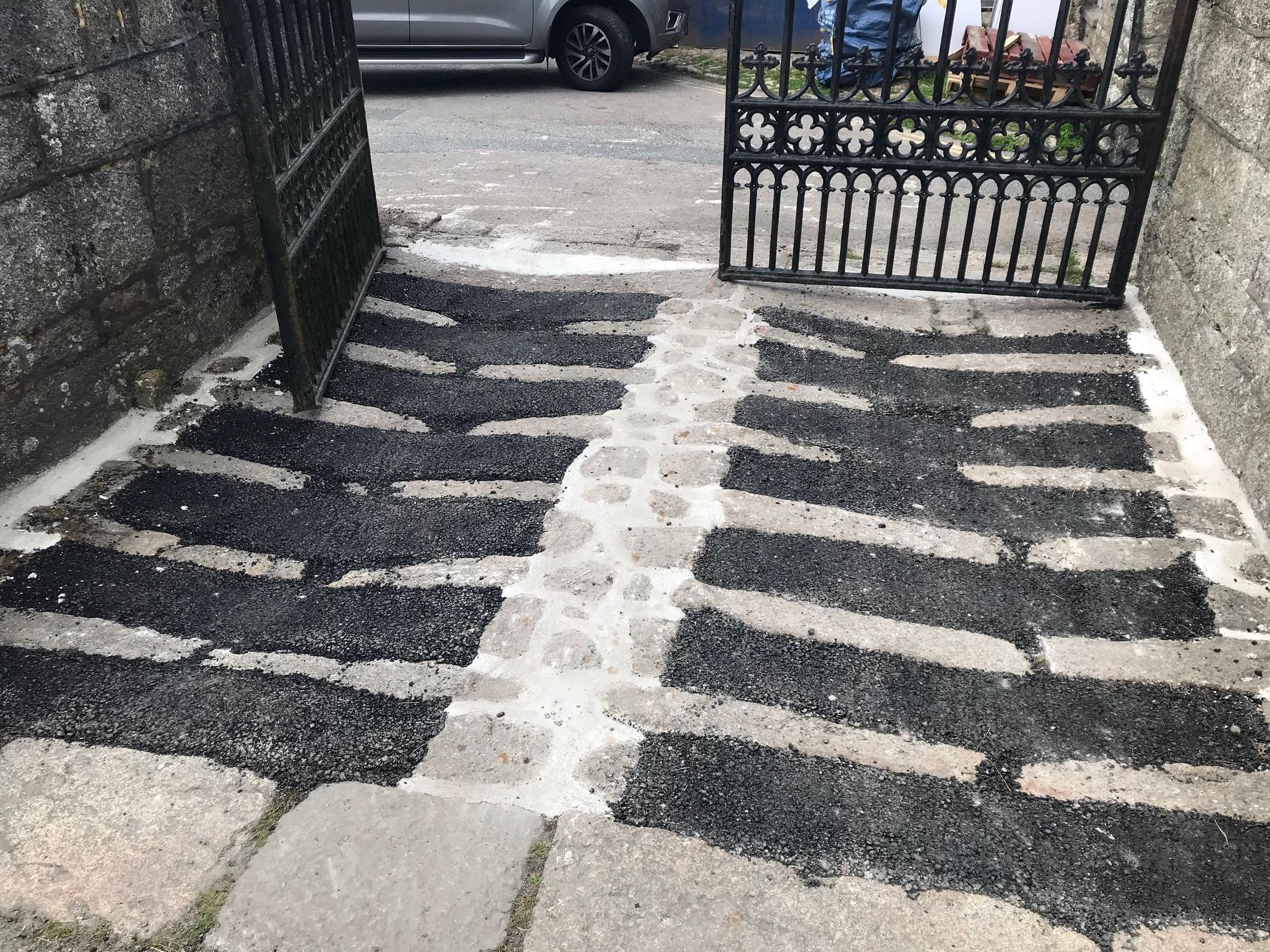 Tarmac poured on St Just parish church path is 'hideous scar'