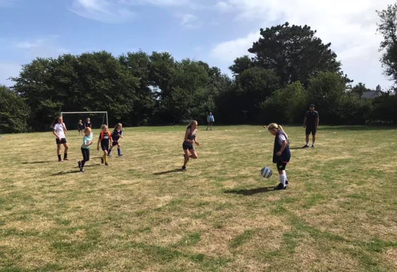 Isles of Scilly children show off footy skills during Plymouth Argyle roadshow