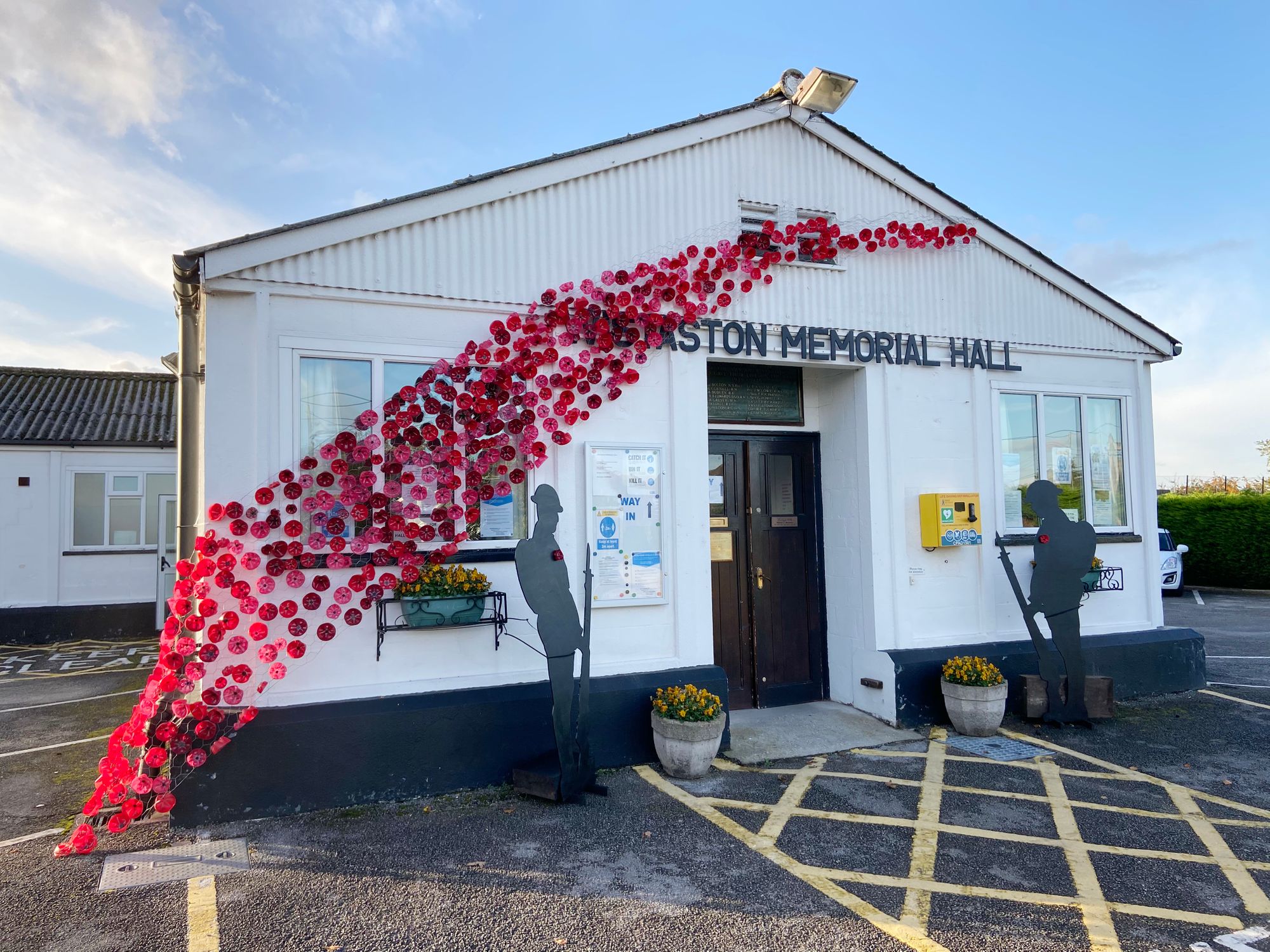 Remembrance Day poppy cascade and silhouetted soldiers go on display in Wistaston