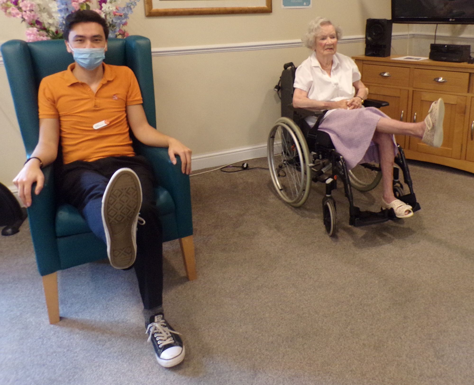Enthusiastic resident leads yoga group at Middlesex care home