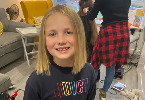 Hoddesdon seven-year-old raises more than £1,800 by cutting long hair for Little Princess Trust