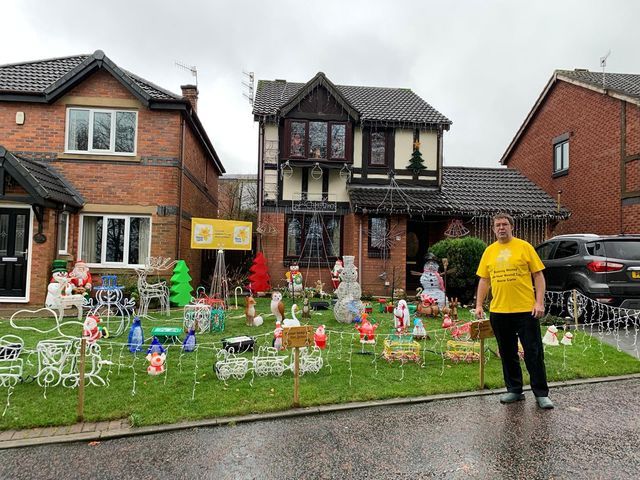 Accrington man switches on Christmas lights in aid of Marie Curie