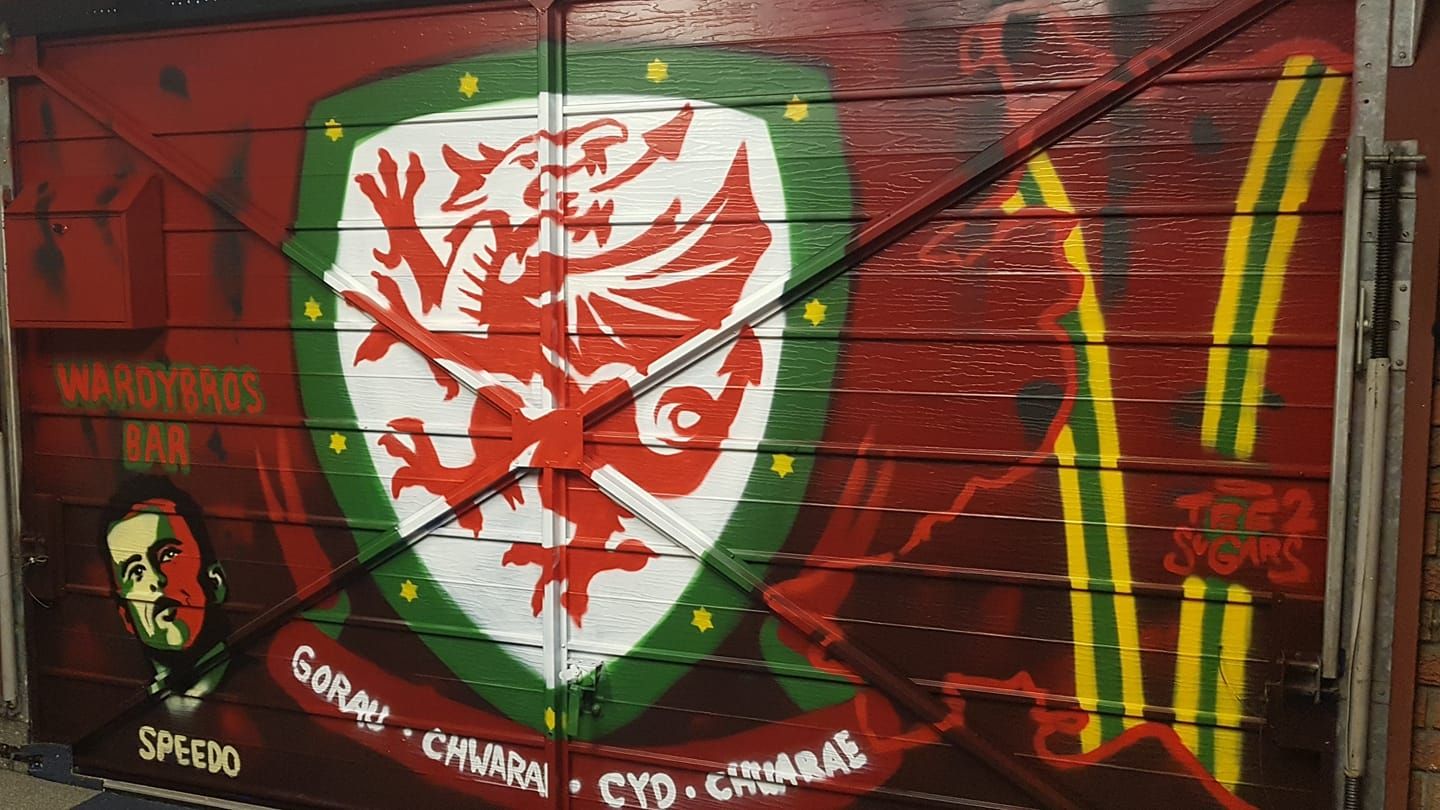 The Rhondda mancave bar with a mural to Gary Speed and the national football team
