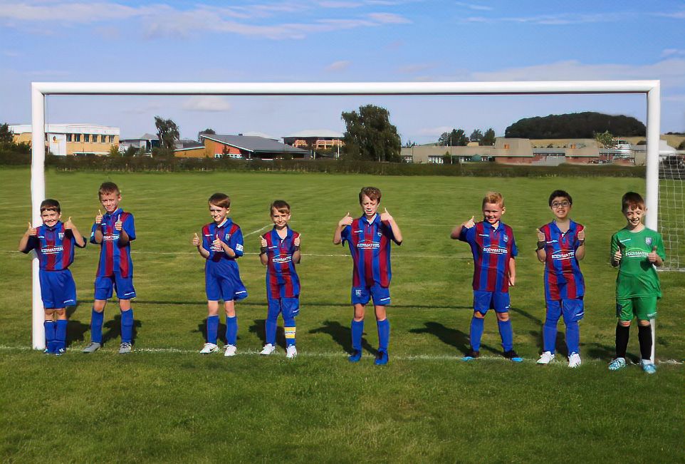 Under nines football team run, walk and cycle to fundraise for charity