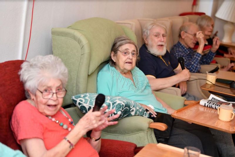 Singing lifting spirits of Reigate care home residents