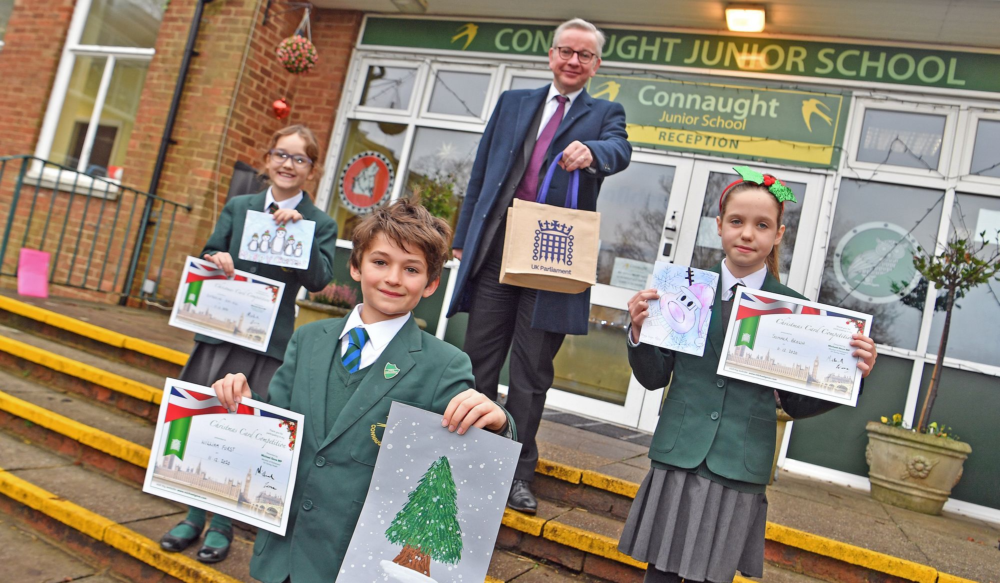 Michael Gove visits Bagshot school to congratulate Christmas Card design winner