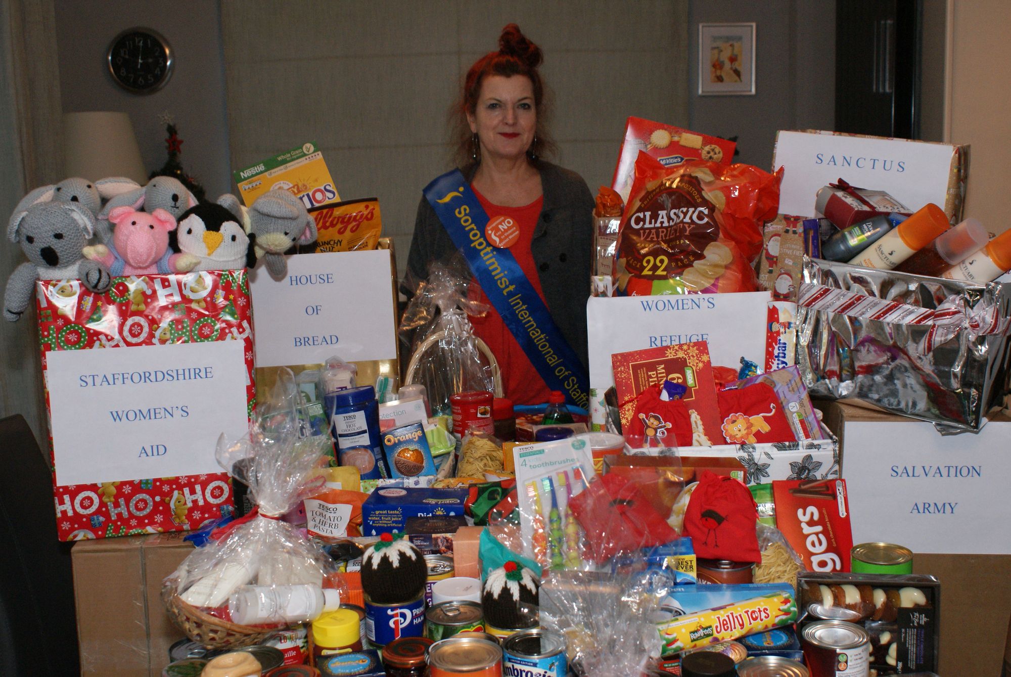 Volunteer group donate reverse advent boxes to charities