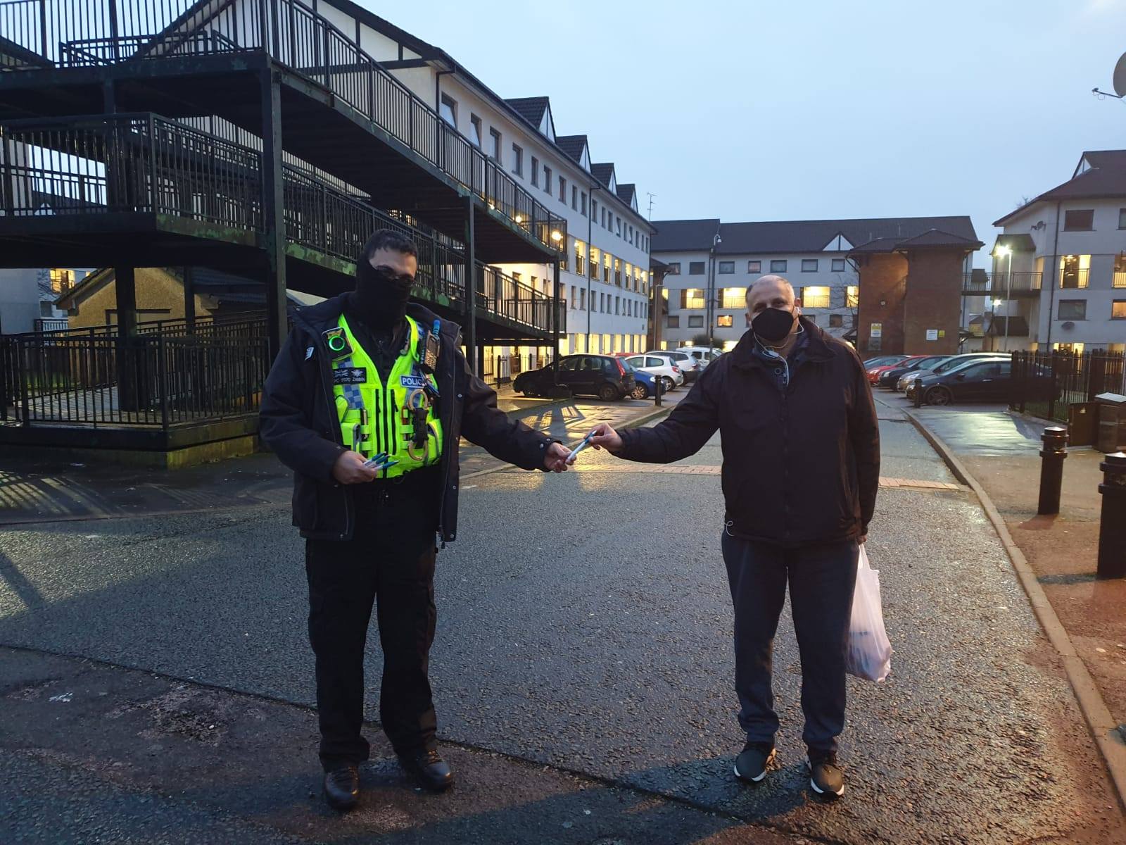 Police officers work to make Freehold Estate a safer place.