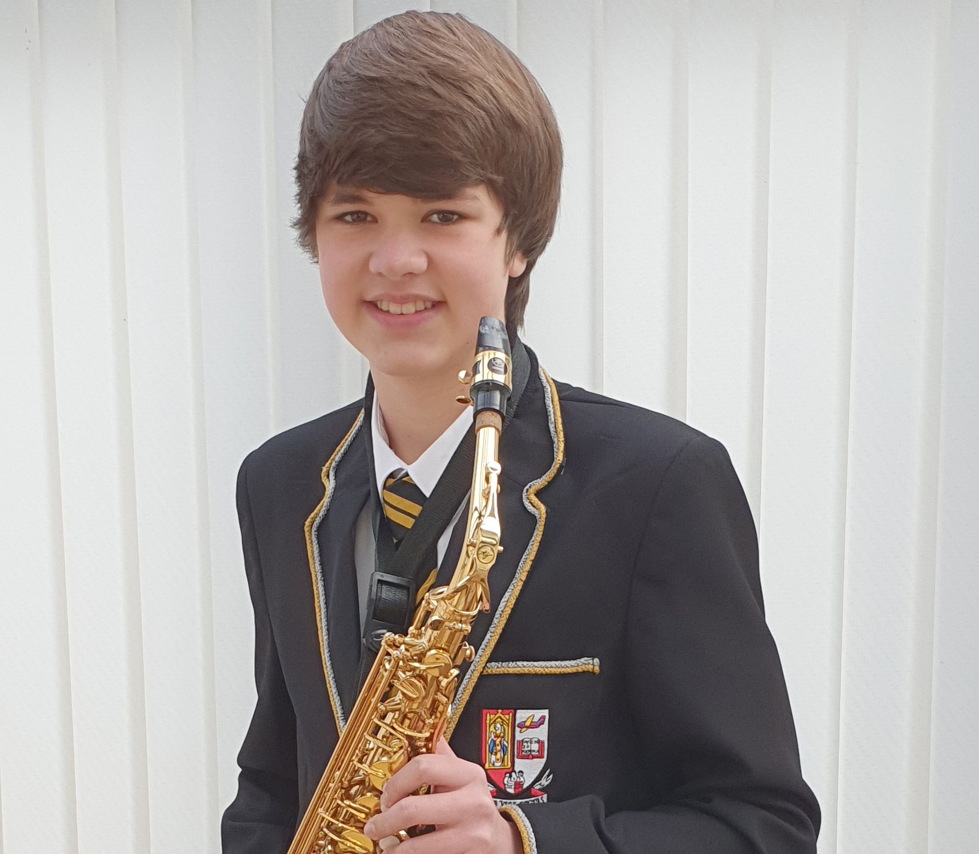 Prestwick teen saxophone player receives Grade 8 distinction