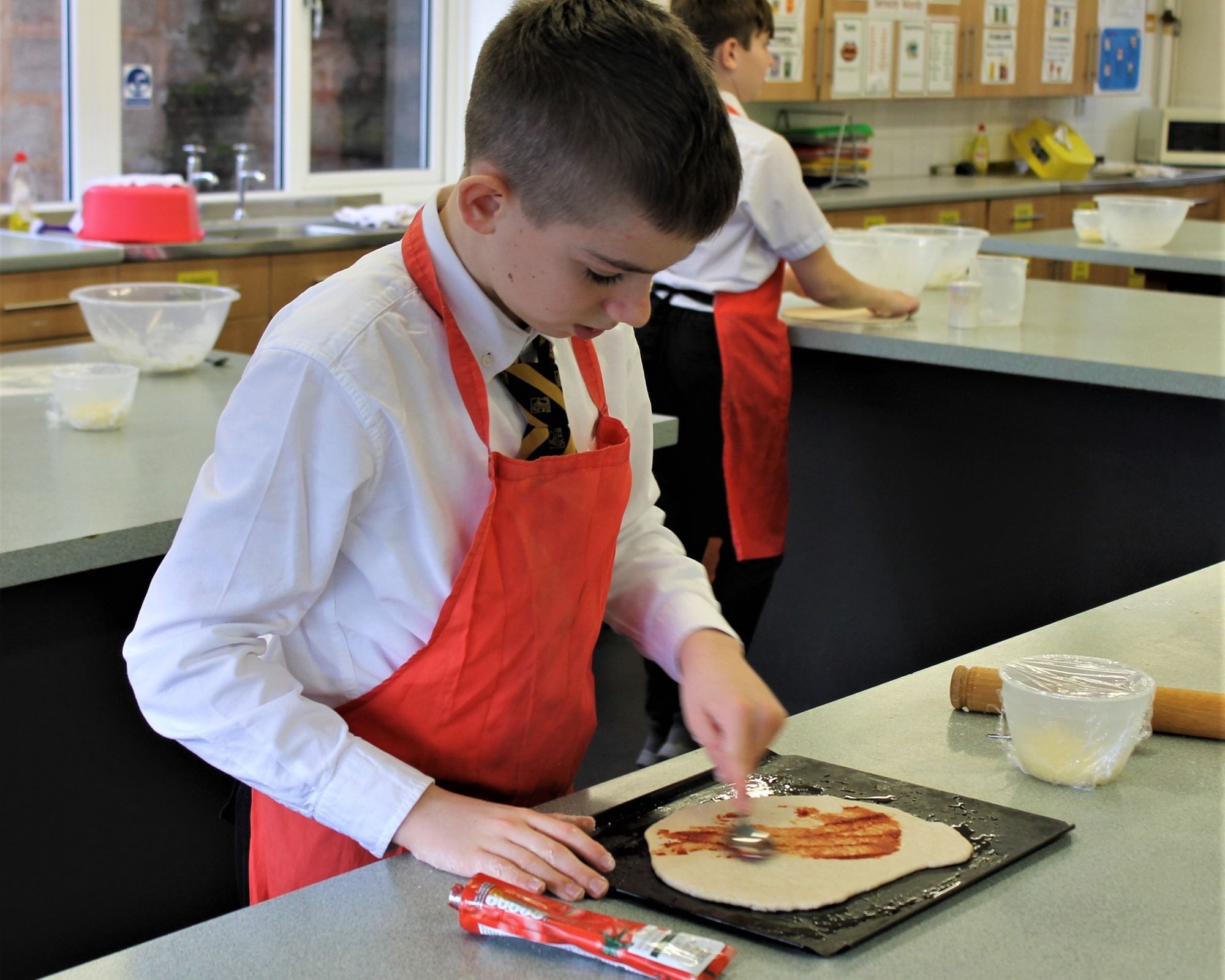 Tesco's pizza donation helps Crediton QE host cook off