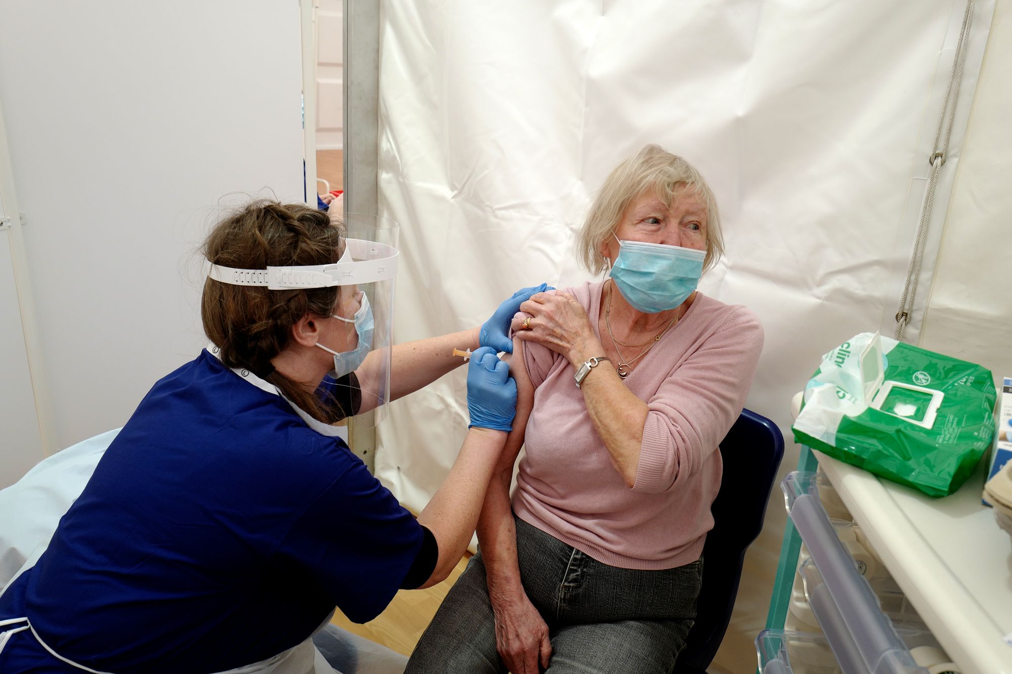 How many Covid-19 vaccines have been administered region-by-region?