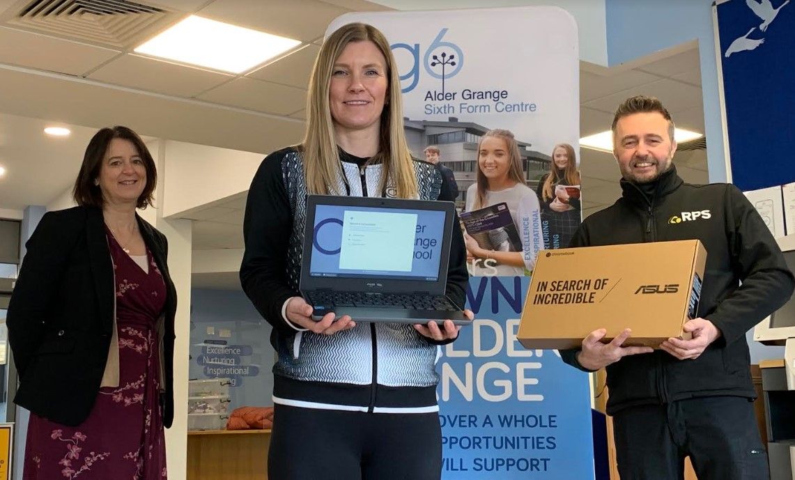 Firm donates two NEW laptops to help pupils with remote learning