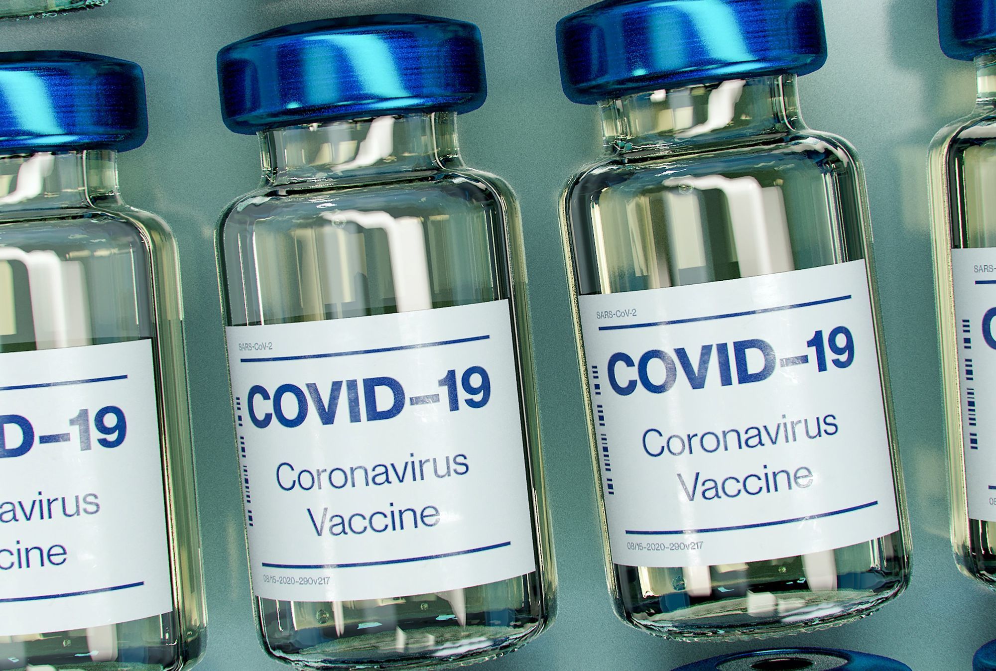 Vaccine supply delay, UK landmarks to turn purple, changes to stamps: The lunchtime headlines