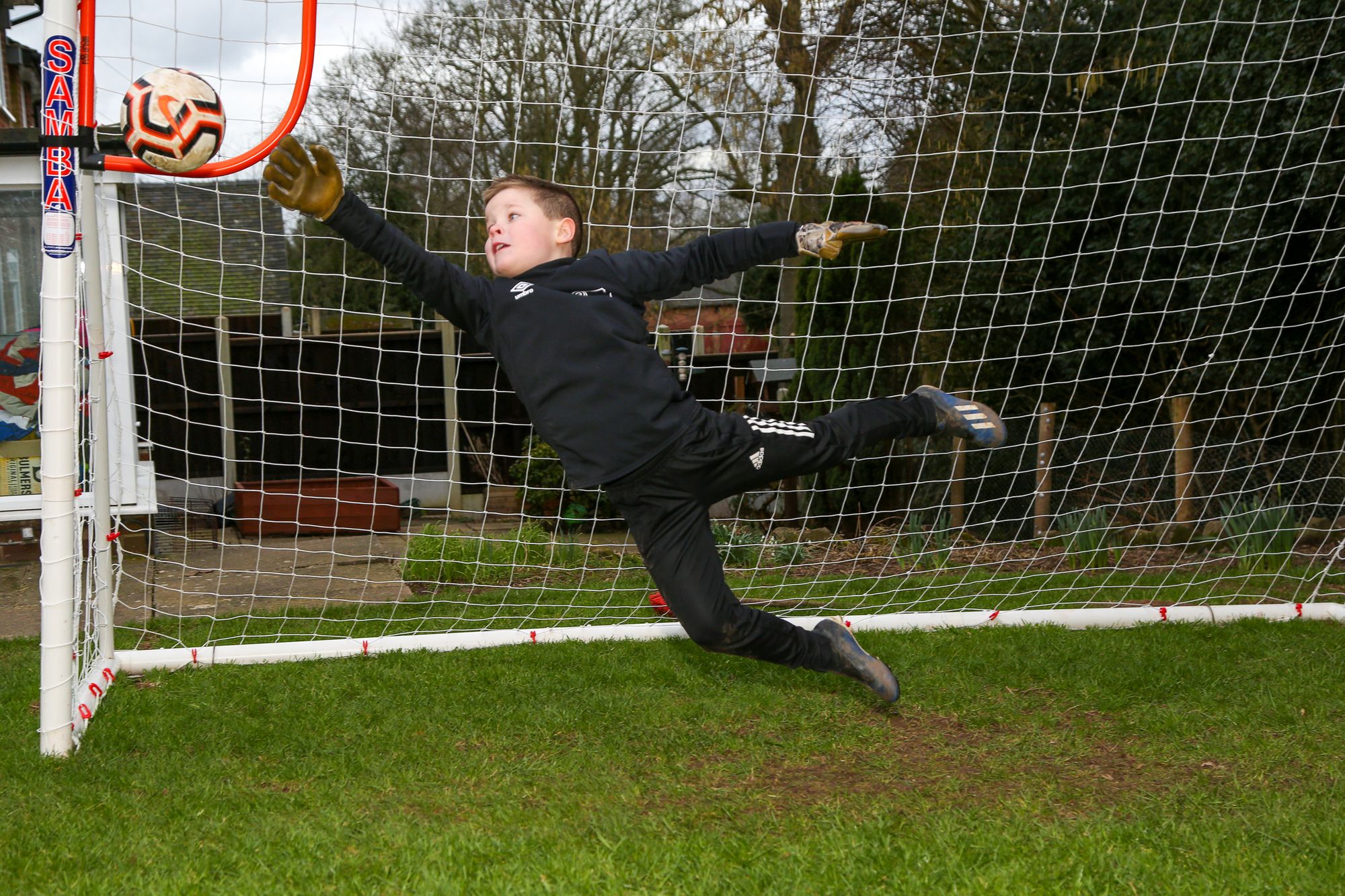Goalkeeper Sidney stretches himself to help support cancer sufferer