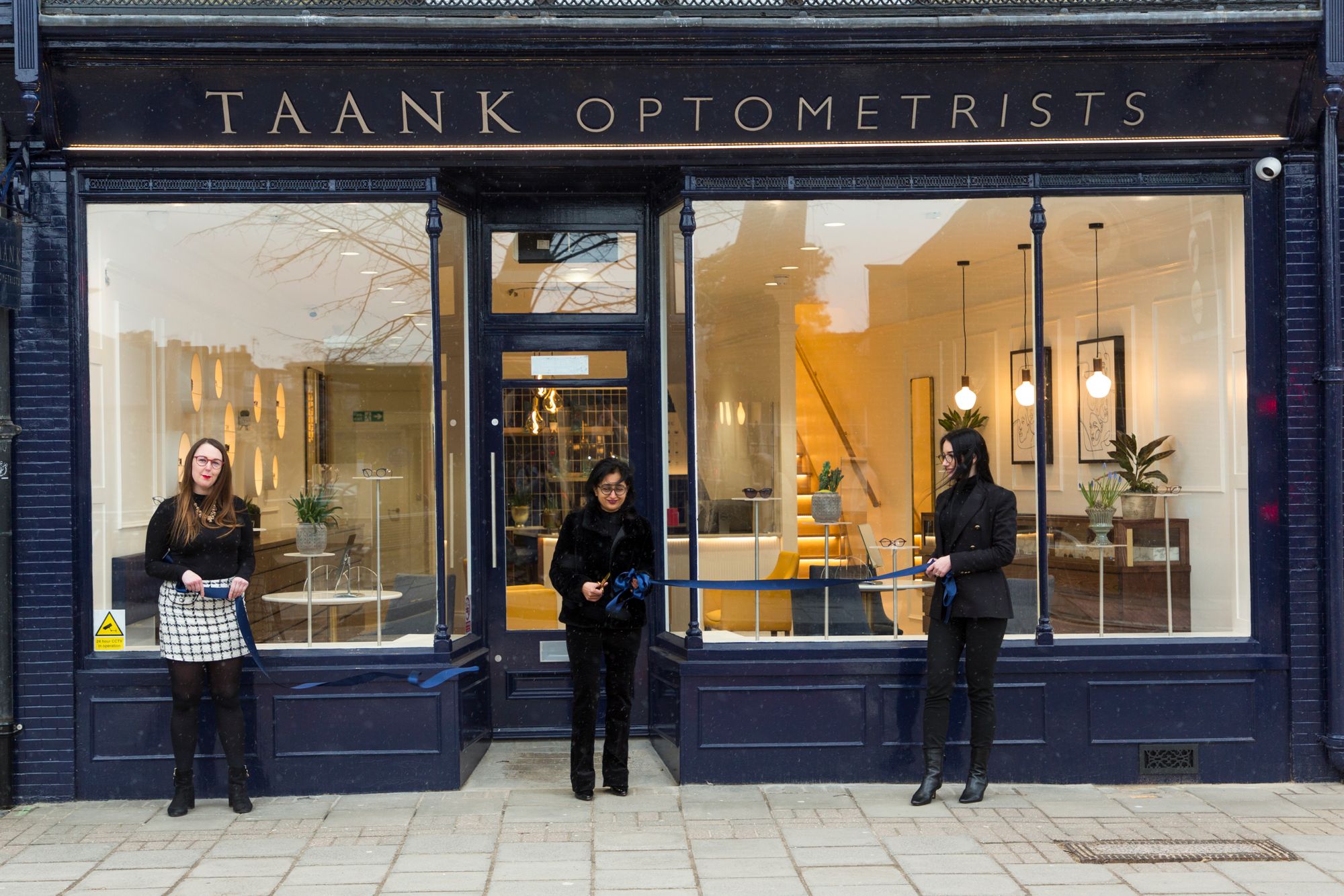 Mill Road Taank Optometrists reopens following devastating fire