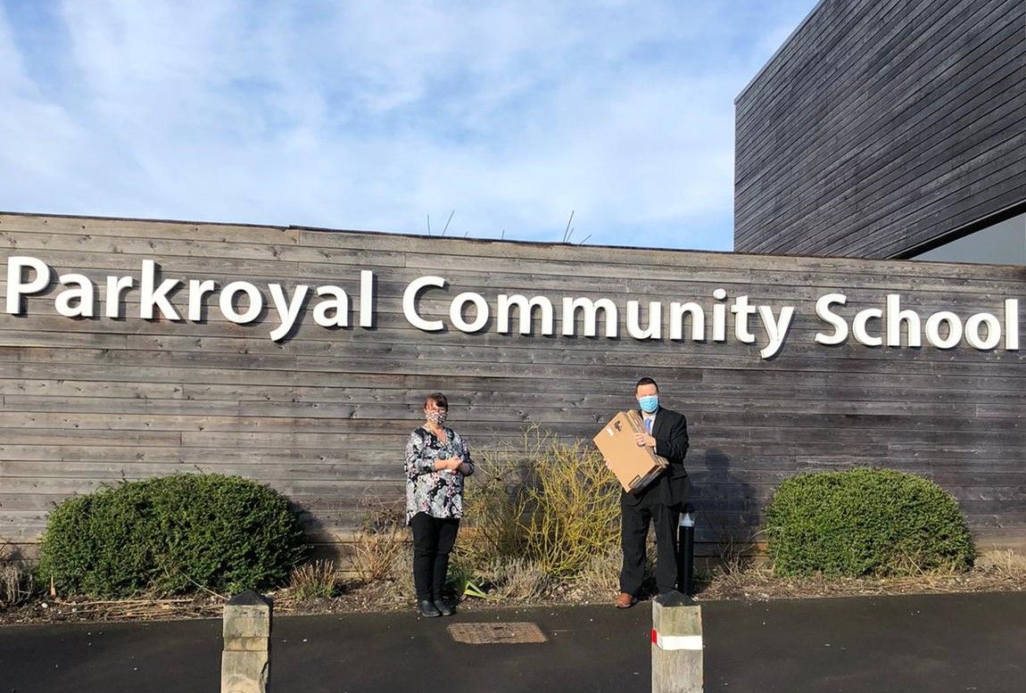 Solicitors' computer donation just in time for school return