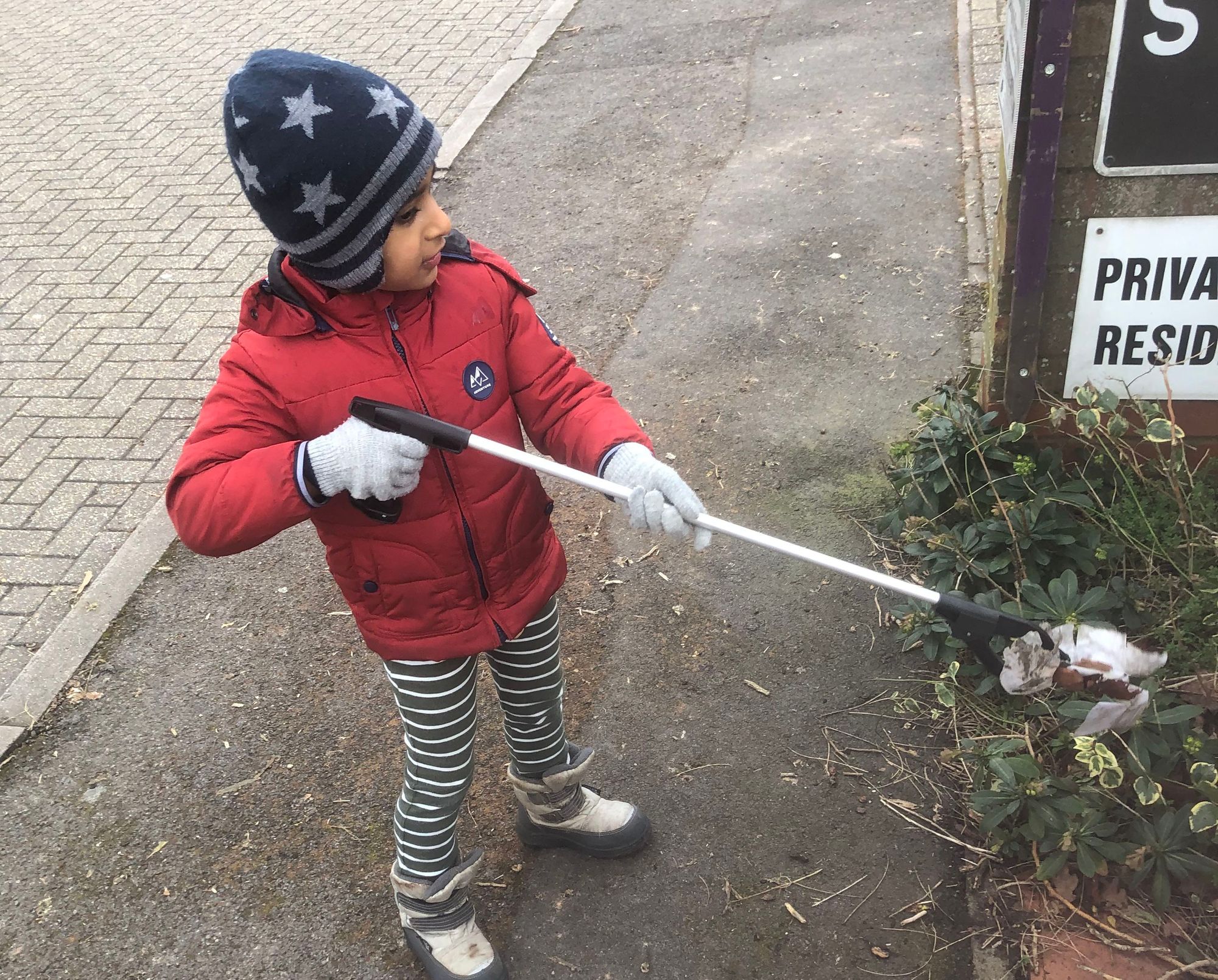 Five-year-old environmentalist cleans up streets of St John's