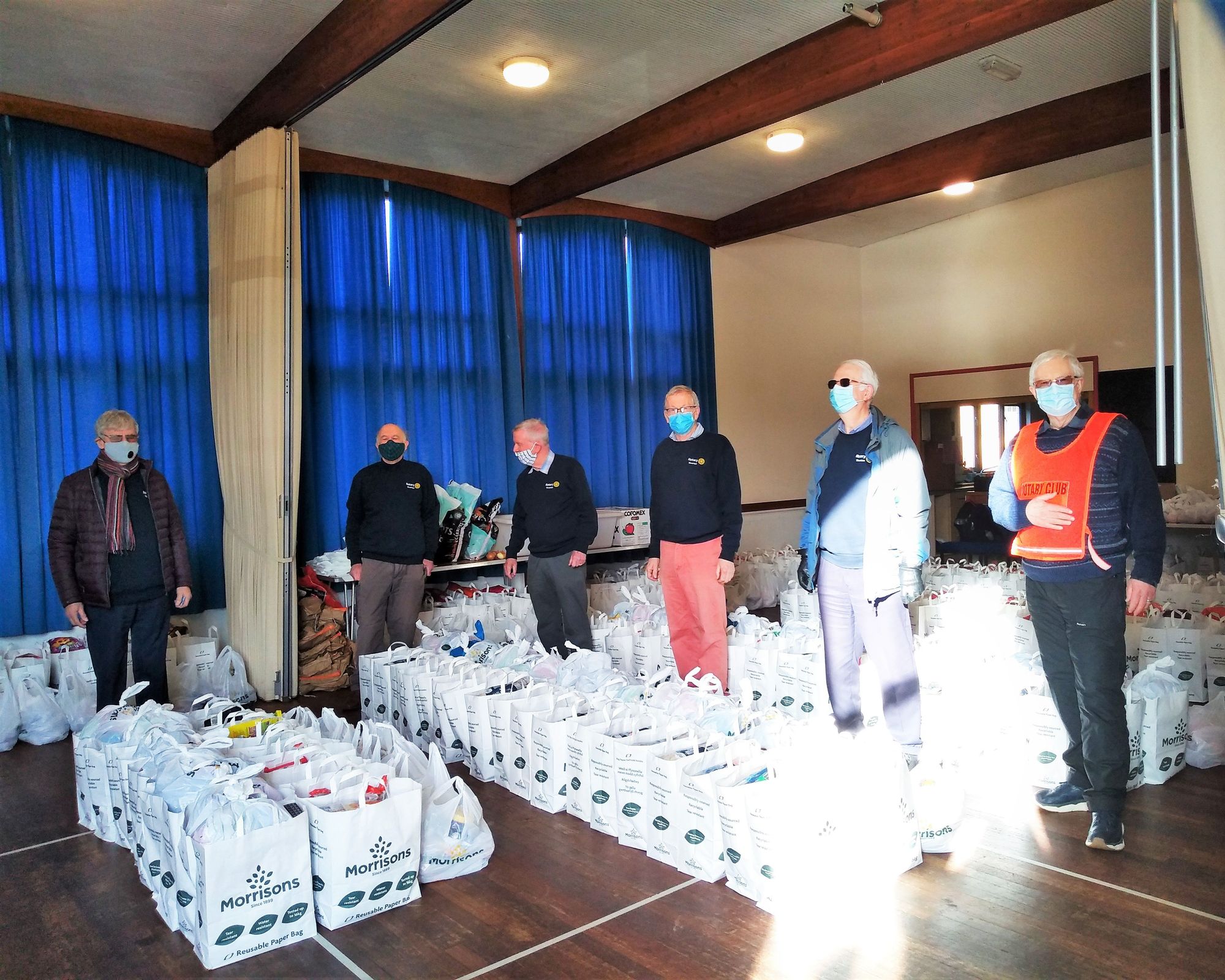 Rotarians help provide booster food packs with CHAT in Tiverton