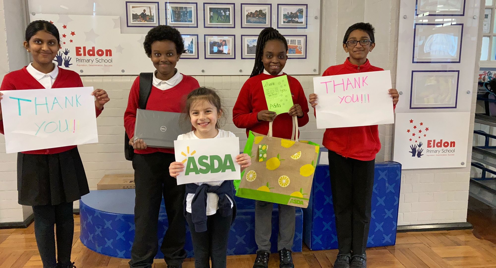 Asda Edmonton surprises local primary school with new laptops