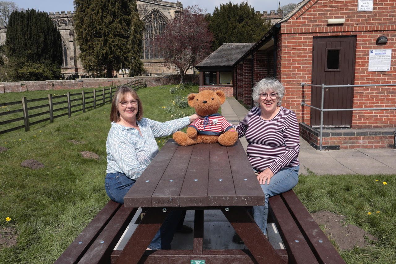 Edward Bear checks out church's new memorial bench