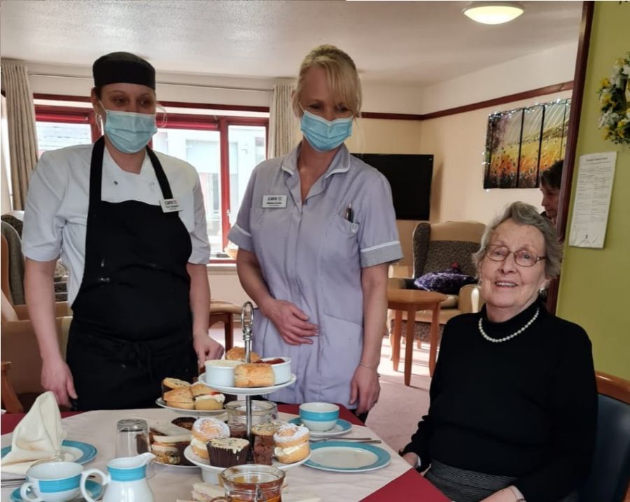 Woking care home welcomes special guest to dine through the decades