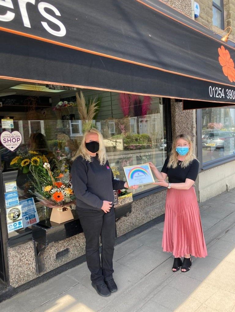 Welcome back blooms earned Hyndburn business a hero award