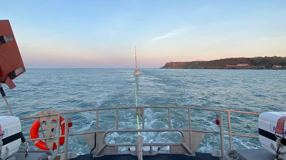 Exhausted sailor towed back to the safety of Brixham Harbour