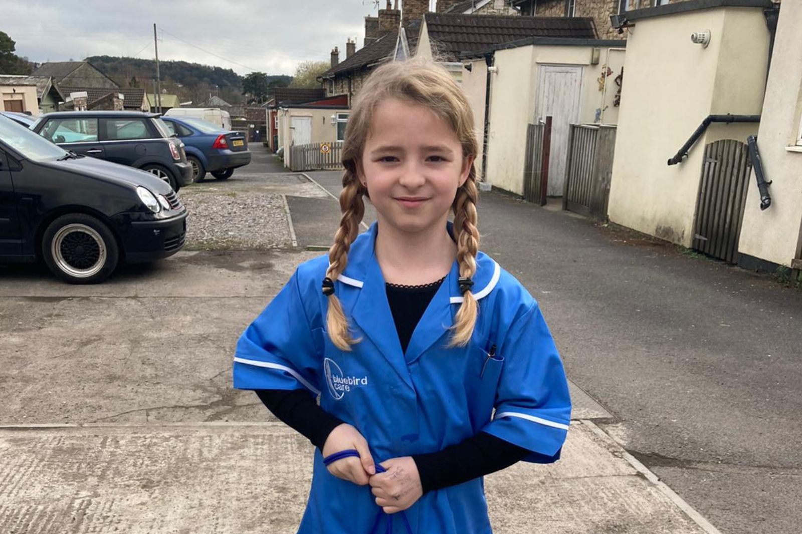 Nine-year-old dresses as keyworker mum for superhero day