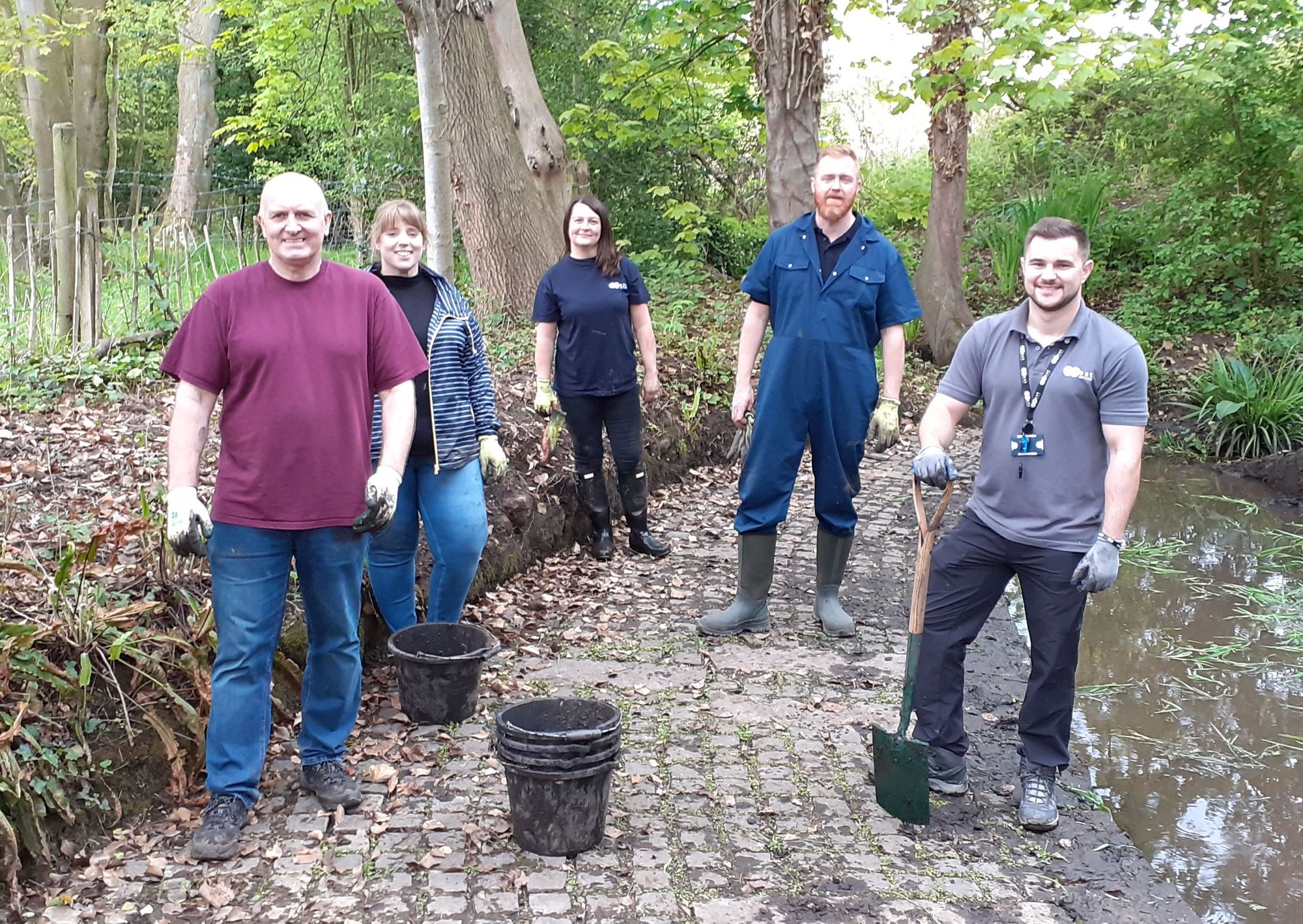 Volunteers help restore local beauty spot in Burton village
