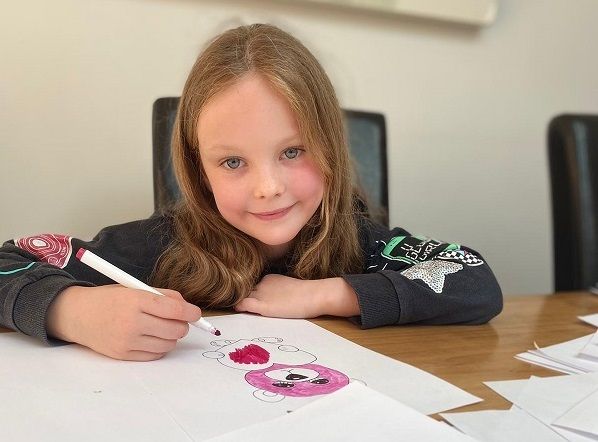 Inspiring seven-year-old Warwickshire artist is spreading happiness