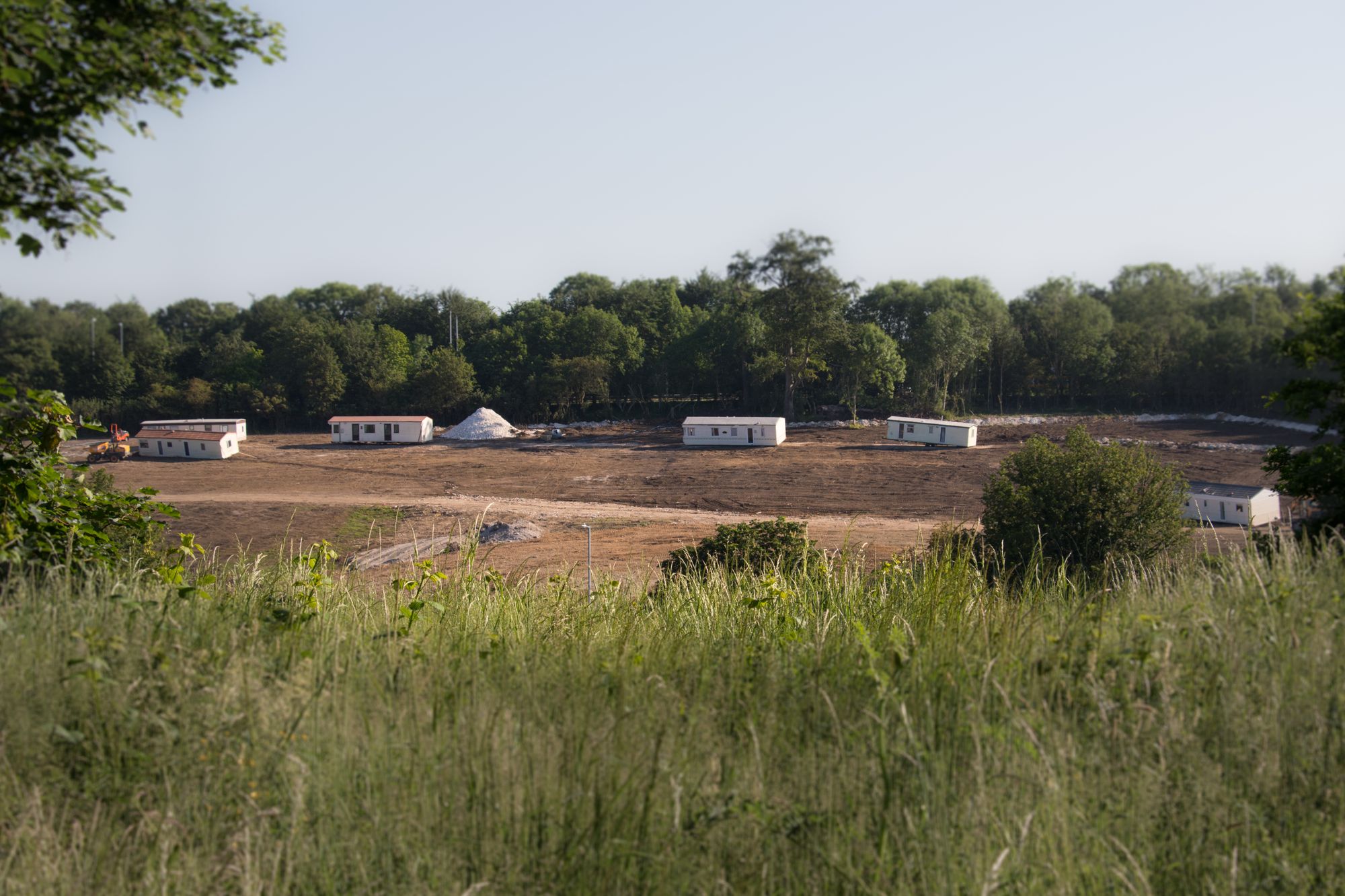 Calls for action over Halstead Hill 'scarred' by earthworks and caravans