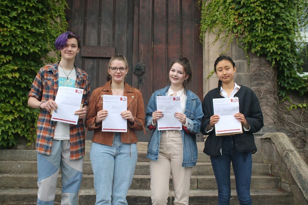 Smiles all around as Queen Elizabeth's Grammar School students collect A-level results