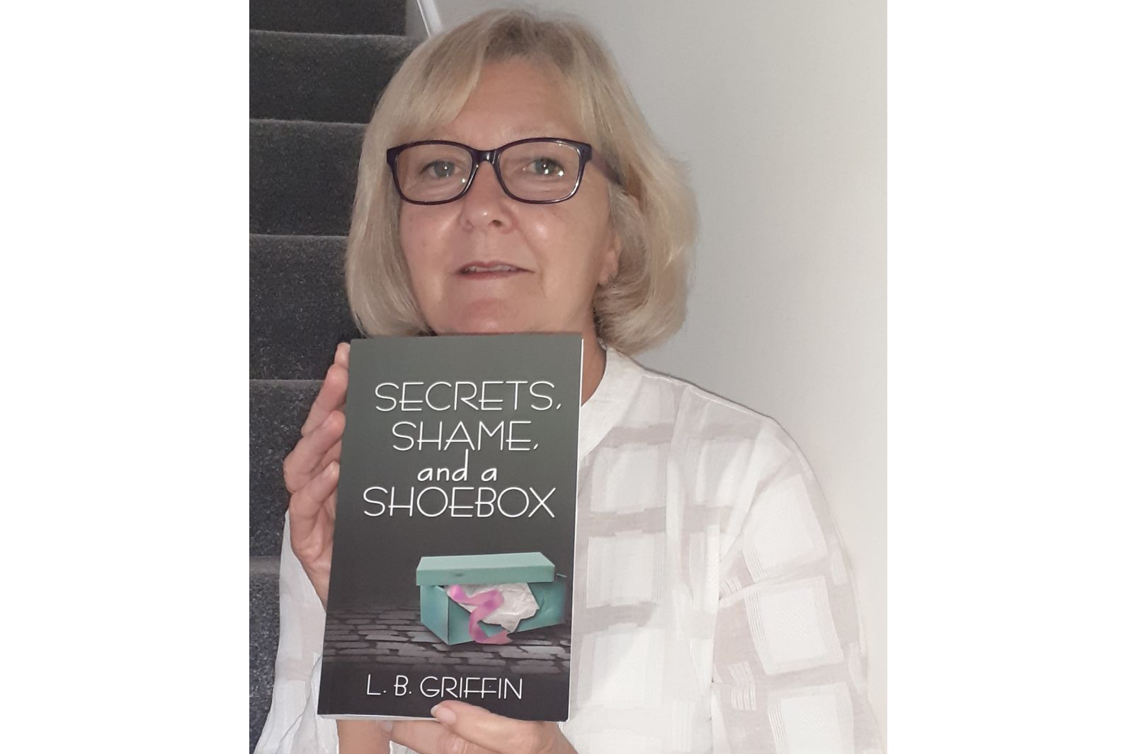Surprise author emerges from Bath with debut novel Secrets, Shame and a Shoebox