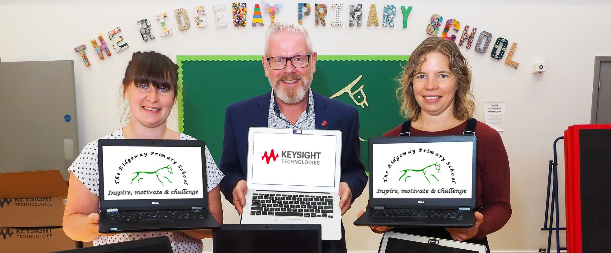 Reading primary school receive laptop donation