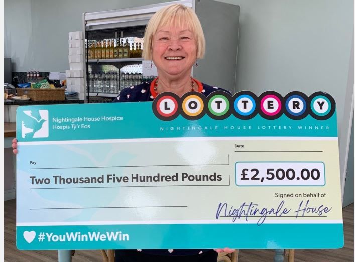 Wrexham woman thanked for 18 years as hospice lottery collector